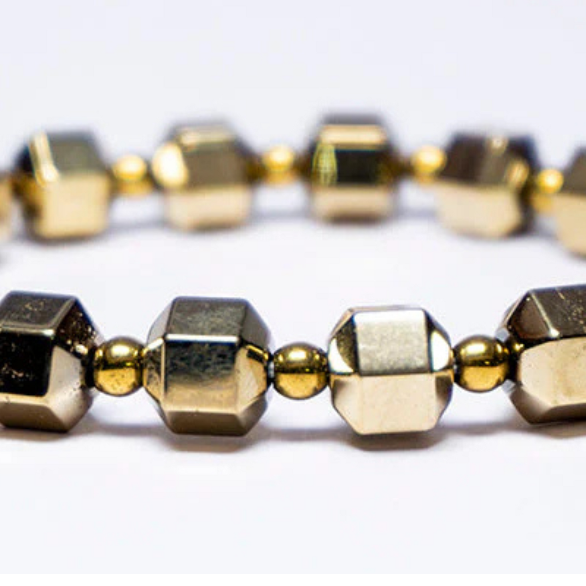 Boost Confidence and Energy with the Golden Hematite Cube Bracelet